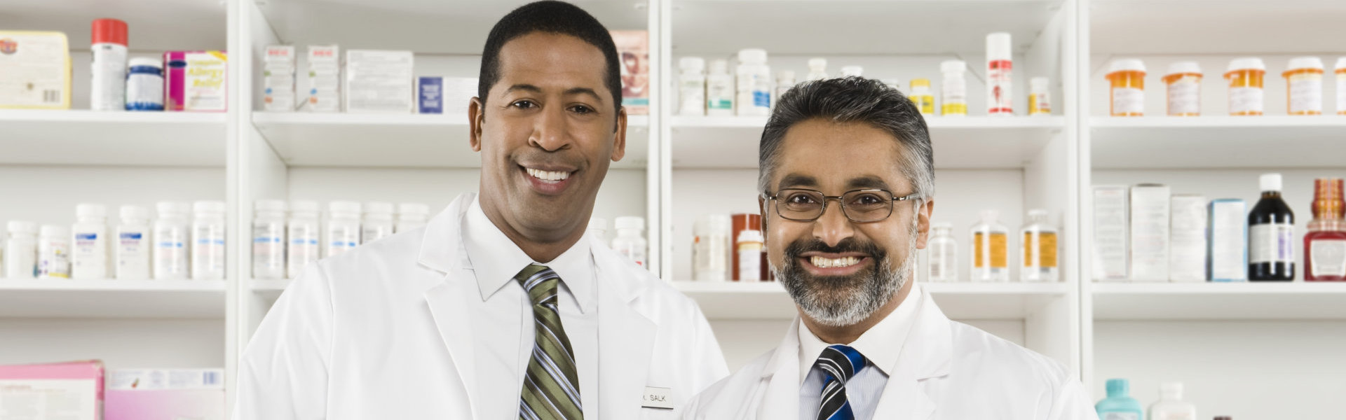 two pharmacist smiling